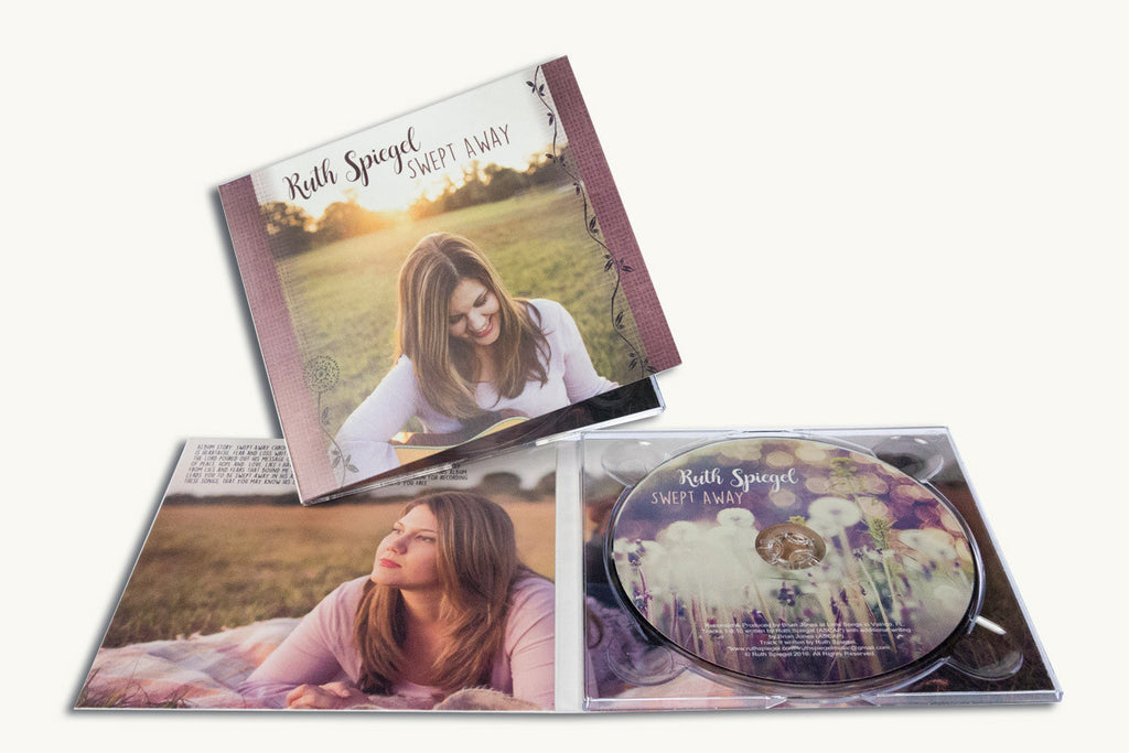 4 panel digipacks with duplicated or replicated CDs or DVDs.